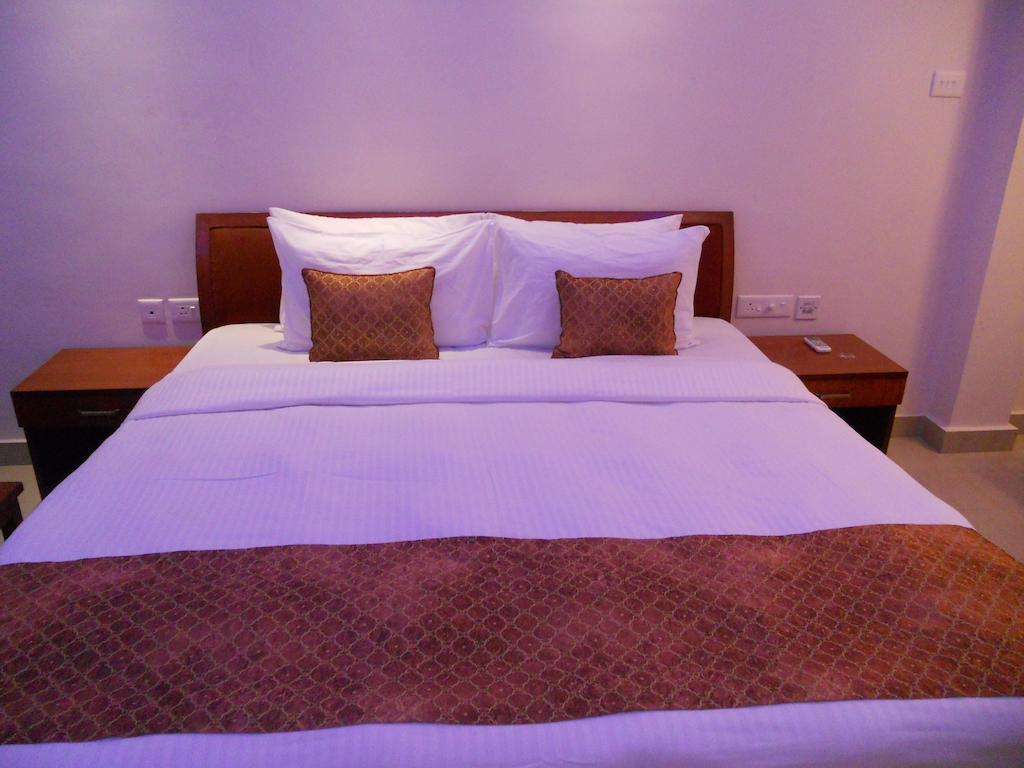 Hôtel Prayag Aristro Club à Calcutta Chambre photo